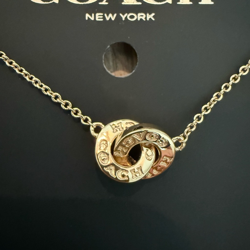 Coach Gold Intertwined Rings Necklace